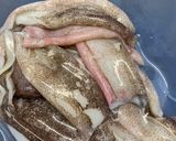 Foto del passaggio 1 della ricetta Calamari ripieni al forno