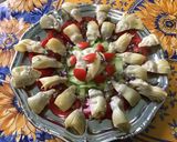 Une image de l'étape 9 de Salade de coeurs d'artichauts aux tomates, concombre et fleurs de thym.
