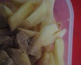 A picture of step 2 of Kfc style chicken garlic fries.