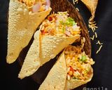 A picture of step 4 of Papad cone Bhel chaat.