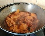 A picture of step 7 of Onion Tomato Chicken.