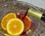 A picture of step 4 of Sangria 🍑 🍌 🍋 🥝 🍊.