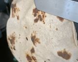 A picture of step 12 of Maharashtrian Lunch Thali of Bhakri, Vangyache Bharit, Phodniche Varan, Gul aani Tup.