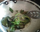A picture of step 12 of Fafada-Kadhi with Grated Raw Papaya.