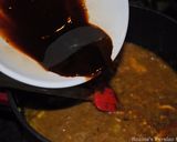 A picture of step 8 of Khoresht-e Fesenjan ( Pomegranate stew with chicken and walnut.