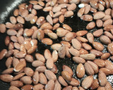 A picture of step 1 of Cocoa and Sugar Almonds.
