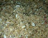 A picture of step 2 of Til ladoos with coconut and nuts.