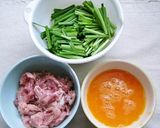 A picture of step 2 of Hearty Meal! Garlic Chives, Eggs & Pork Strips.