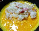 A picture of step 9 of Omelet Rice with Mentaiko Cream Sauce.