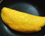 A picture of step 10 of Omelet Rice with Mentaiko Cream Sauce.