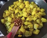 A picture of step 2 of Jeera Aloo (Cumin Potatoes).