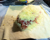 Foto del paso 3 de la receta: Hojaldre de tortilla de patata, jamón serrano y queso