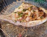 Foto del paso 4 de la receta Dorada rellena de gambas y berberechos