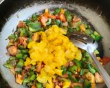 A picture of step 6 of Capsicum prawns.