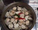 A picture of step 2 of Clear Tom Yum Soup with Three Mushrooms (Vegetarian).