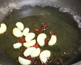A picture of step 4 of Spicy Garlic Sautéed Edamame.