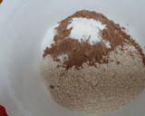 Foto del paso 4 de la receta: Bizcocho de yogur, naranja y cacao