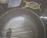 A picture of step 2 of Orange Coconut Peas Pudding.