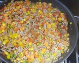 Foto del paso 4 de la receta: Pimentones rellenos de carne y vegetales
