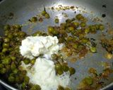 A picture of step 10 of Methi Matar Malai.