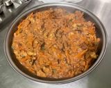 Une image de l'étape 27 de Poulet aux cacahuètes, carottes, tomates et épices.