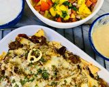 A picture of step 9 of Loaded Nachos with Mango Salsa, Sour cream and cheese sauce.