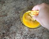 A picture of step 4 of Ham Egg and Cheese Cups.