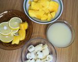 A picture of step 1 of Mango orange smoothie.