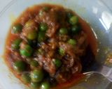 A picture of step 5 of Malai onion matar.