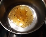 Foto del paso 4 de la receta Donuts de hojaldre con almíbar de miel