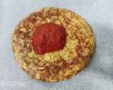 Foto del paso 2 de la receta: Tortipizza de patata y cebolla con jamón serrano