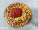 Foto del paso 2 de la receta: Tortipizza de patata y cebolla con jamón serrano