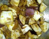 A picture of step 2 of Achaari baingan aloo.