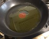 Une image de l'étape 5 de Côtes de porc aux tomates, ail rose et fanes de navets.