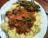 A picture of step 13 of Stewed beef with creamy mashed potatoes served with sauteed buttery string beans.