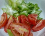 Hình bước làm 2 của món Canh nghêu nấu khế cà chua
