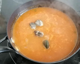 Foto del paso 10 de la receta: Arroz caldoso con langostinos y almejas