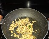 A picture of step 2 of Fried curd Rice.