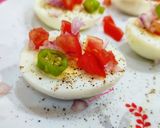 A picture of step 3 of Masala boiled egg street style.