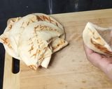 A picture of step 12 of Chicken shawarma pockets.