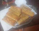 Foto del paso 5 de la receta: Flautas de pan de molde rellenas de salchichas, queso y bacon con puré de papas