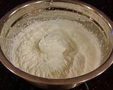 A picture of step 9 of Chocolate Layer Cake with Whipped Hazelnut Cream Filling and Frosting.