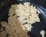 A picture of step 9 of Beef dry chilli with egg fried rice.
