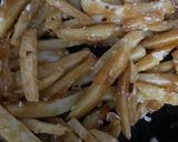 A picture of step 4 of Garlic fries /crispy potatoes 😋.