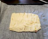 Foto del passaggio 4 della ricetta Sfoglia con zucca,scamorza e speck