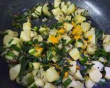 A picture of step 3 of Potatoes with Green Onion.