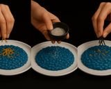 Foto del passaggio 8 della ricetta Risotto Blu con Spirulina e Agrumi