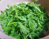 Hình bước làm 1 của món Rau tần ô nấu canh với thịt xay