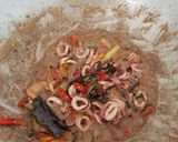 Foto langkah ke 6 dari resep Tumis Cumi Kemangi Santan Pedas Empuk.