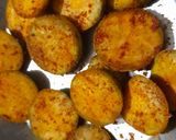 A picture of step 2 of Brinjal disk or baigan bhaja.